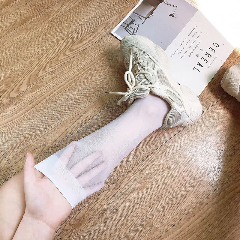 Summer Ultrathin Women's Silk Socks – Black, translucent, and stylish, with a medium calf sleeve