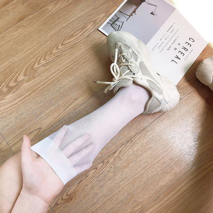 Summer Ultrathin Women's Silk Socks – Black, translucent, and stylish, with a medium calf sleeve